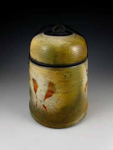 The Warm Textures and Red Raku Ceramic Cremation Urn